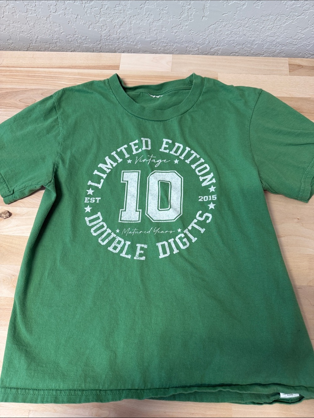 The Limited Green Short Sleeve Tee with White '10' Graphic
